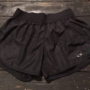 Patterned black athletic shorts